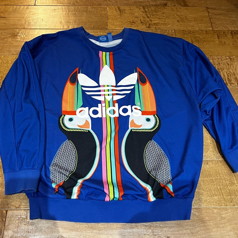 adidas Blue Crew Neck Sweater with Colorful Toucan Design